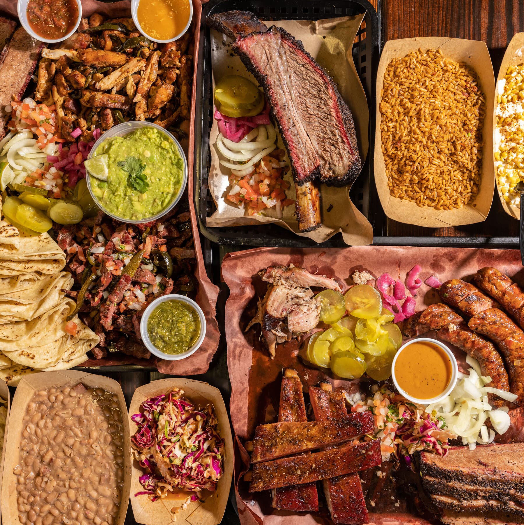 Brick's BBQ board with smoked meats and sides